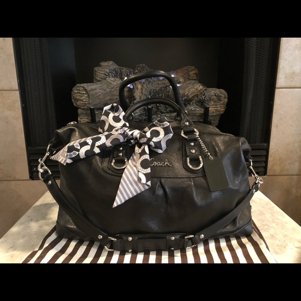 Black Coach handbag with crossbody strap